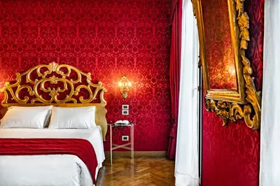 Letto o letti in una camera di Palazzo San Lorenzo