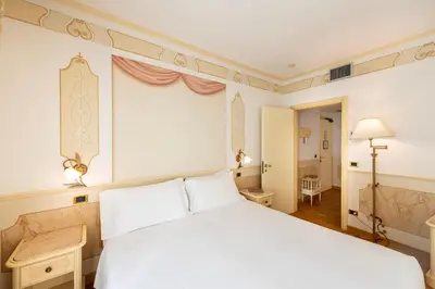 Letto o letti in una camera di Majestic Toscanelli (centro storico)