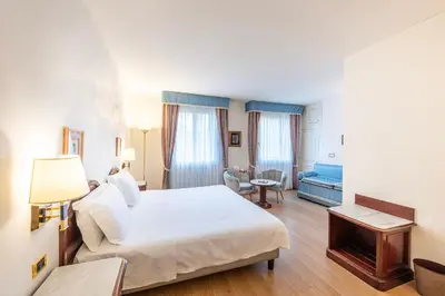 Letto o letti in una camera di Majestic Toscanelli (centro storico)