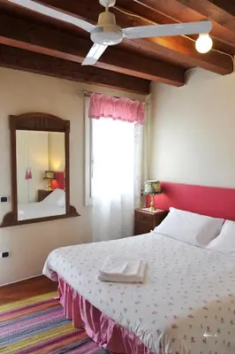 Letto o letti in una camera di B&B Vicenza San Rocco