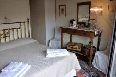 Letto o letti in una camera di B&B Vicenza San Rocco