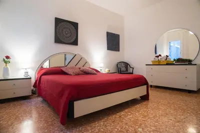 Letto o letti in una camera di CasaMisa Ca' Amaranta