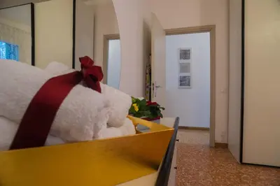 Letto o letti in una camera di CasaMisa Ca' Amaranta