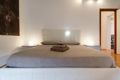 Letto o letti in una camera di ATTIC FLOOR VENICE APARTMENT