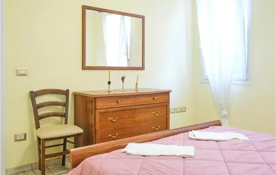 Letto o letti in una camera di Casa Marina