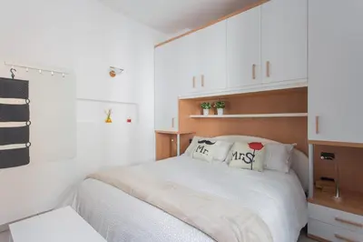 Letto o letti in una camera di Autentico Trilocale, vista mozzafiato sul Canale