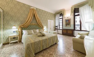 Letto o letti in una camera di Friendly Venice Suites