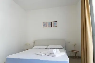 Letto o letti in una camera di Dainese Apartments, Casa Abigail