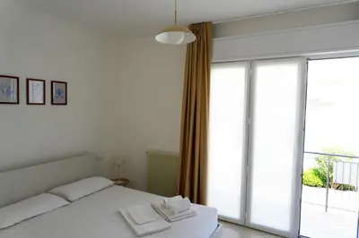 Letto o letti in una camera di Dainese Apartments, Casa Abigail