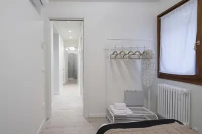 Letto o letti in una camera di Apartments in San Marco with Canal View by Wonderful Italy