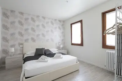 Letto o letti in una camera di Apartments in San Marco with Canal View by Wonderful Italy