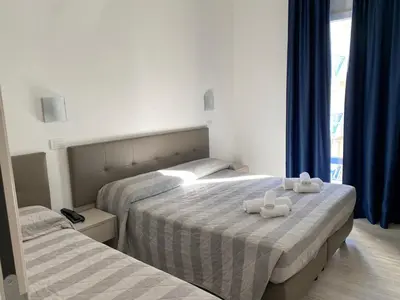 Letto o letti in una camera di Hotel Arena
