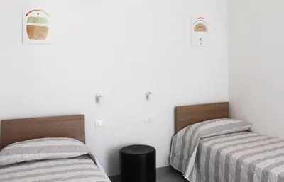 Letto o letti in una camera di Dainese Apartments, Casa Miriam