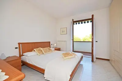 Letto o letti in una camera di Residence Perla