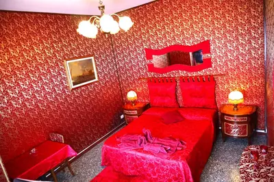 Letto o letti in una camera di Venice Rainbow Apartment San Marco