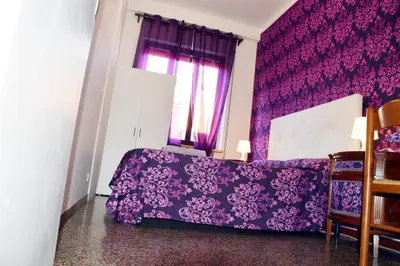 Letto o letti in una camera di Venice Rainbow Apartment San Marco