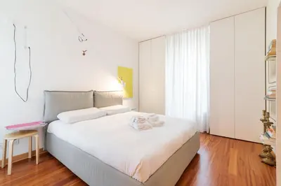 Letto o letti in una camera di GuestHost - Scrovegni Design Apartment
