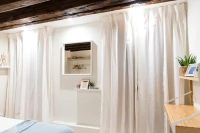 Letto o letti in una camera di Mirandolina Venice Exclusive Guesthouse