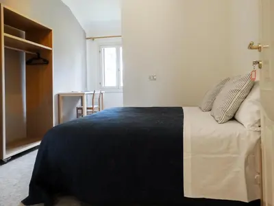 Letto o letti in una camera di Guest House Villa Angaran San Giuseppe