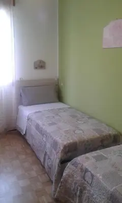Letto o letti in una camera di CASA FEDERICA