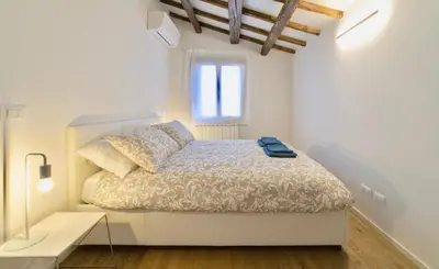 Letto o letti in una camera di New apartment in Murano the amazing glass island
