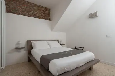 Letto o letti in una camera di Ca' Flavia