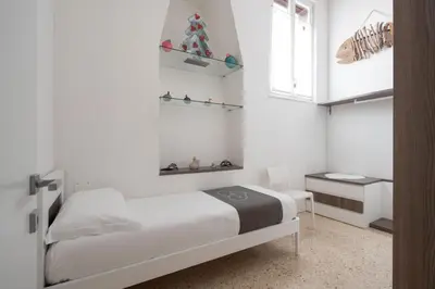 Letto o letti in una camera di Ca' Flavia