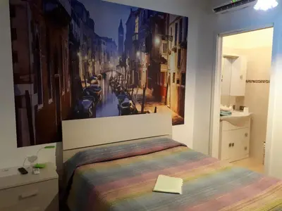 Letto o letti in una camera di Comfort Murano room