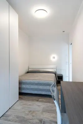 Letto o letti in una camera di Residence Cavalli