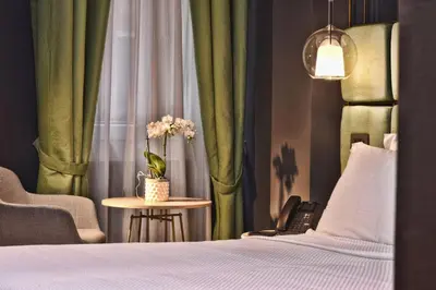Letto o letti in una camera di Hotel Maison Ducal