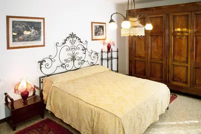 Letto o letti in una camera di Cà Lezze Bell'appartamento nel cuore di Venezia