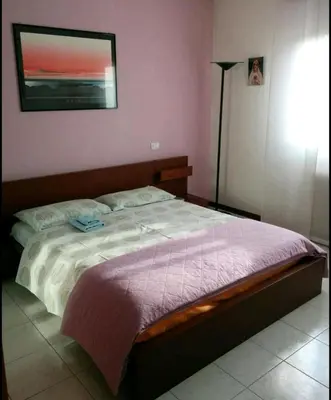 Letto o letti in una camera di Purple house