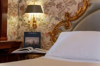Letto o letti in una camera di Bellevue Luxury Rooms - San Marco Luxury
