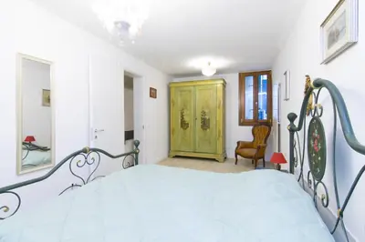 Letto o letti in una camera di Ca' Alberto Apartments