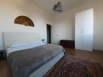 Letto o letti in una camera di Sunrise Apartment in Giudecca