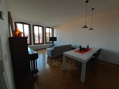Area soggiorno di Sunrise Apartment in Giudecca
