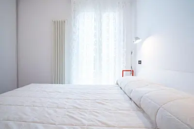 Letto o letti in una camera di Antica Pusterla Home Relais
