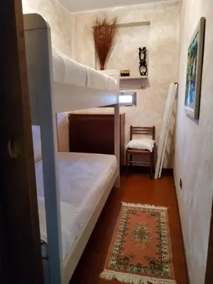 Letto o letti in una camera di LA CARLOTTINA