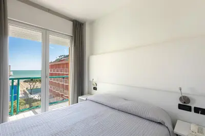 Letto o letti in una camera di Hotel Kennedy