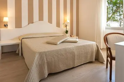 Letto o letti in una camera di Hotel Parioli