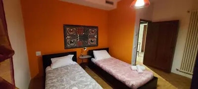 Letto o letti in una camera di Ca Rossa - Venezia