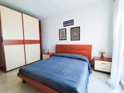 Letto o letti in una camera di Apartments in Cavallino-Treporti 27935