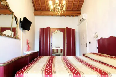 Letto o letti in una camera di B&B Cittabella