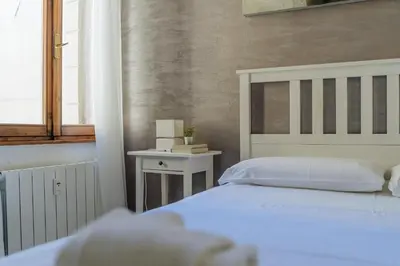 Letto o letti in una camera di Yourbanflat Clock Tower