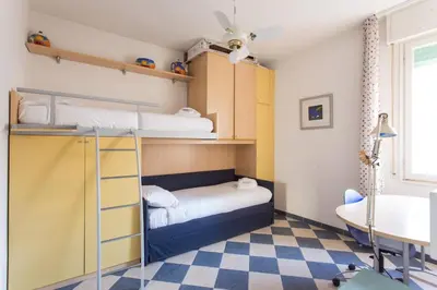 Letto o letti in una camera di Ca Maria Lido di Venezia