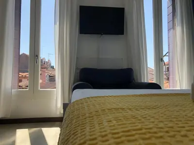 Letto o letti in una camera di Al CINEMA ITALIA