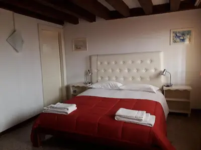 Letto o letti in una camera di Cà Del Giazzo