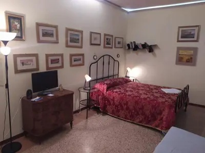 Letto o letti in una camera di Exclusive Ca Quadri Apartments