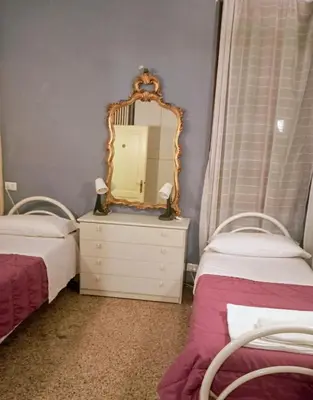 Letto o letti in una camera di Exclusive Ca Quadri Apartments