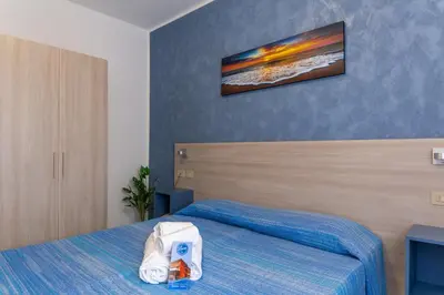 Letto o letti in una camera di Hotel Laura